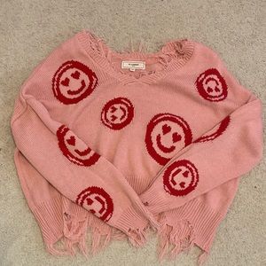 Pink heart eye smiley v-neck sweater